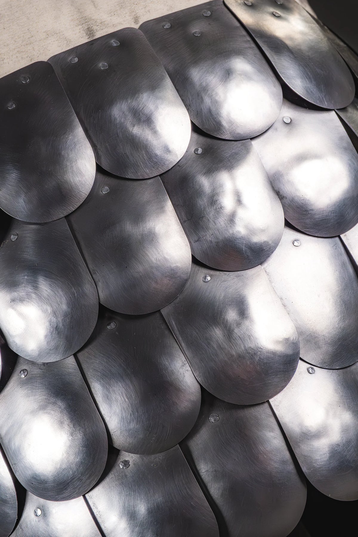Scale skirt — overlapping plate detail